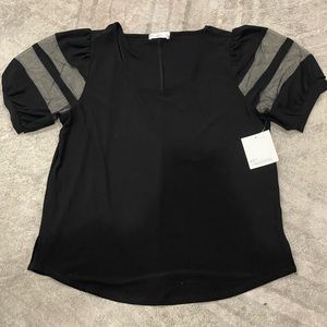 Black top with sheer sleeves